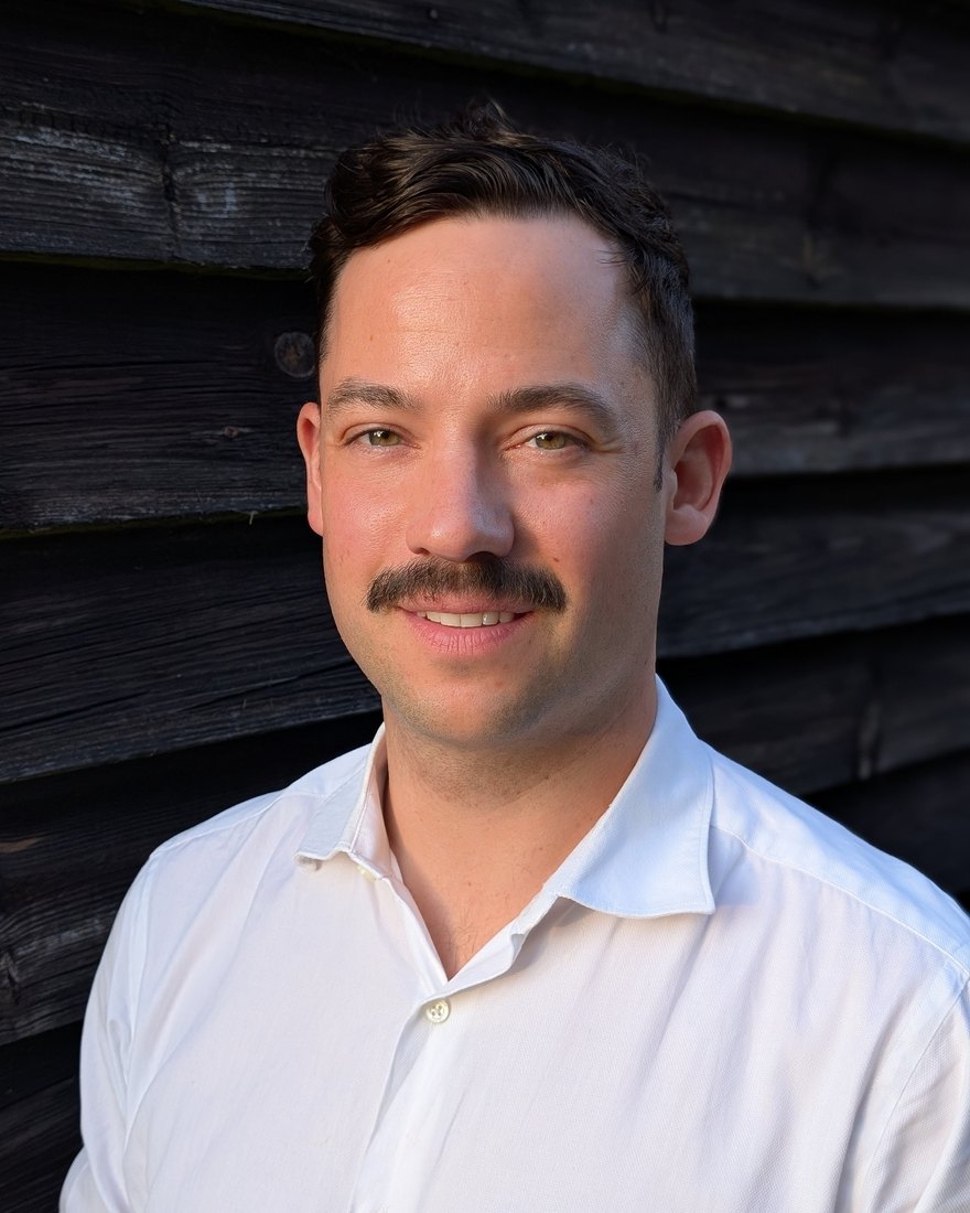Portrait of Dr Toby Greenall